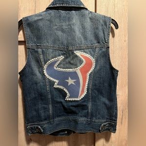 Houston Texans denim sleeveless jacket.  Small